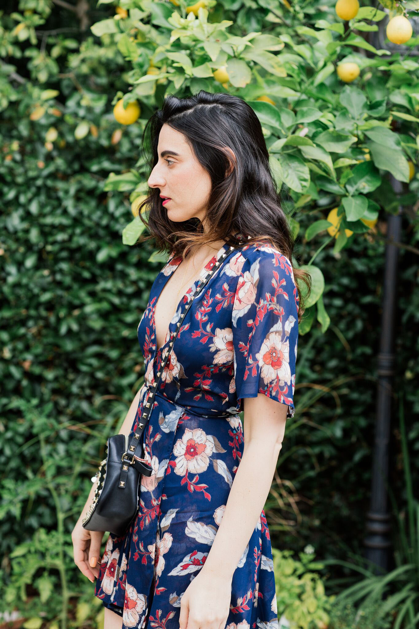 Blogger Style notes by belen wears reformation dress with valentino bag 5