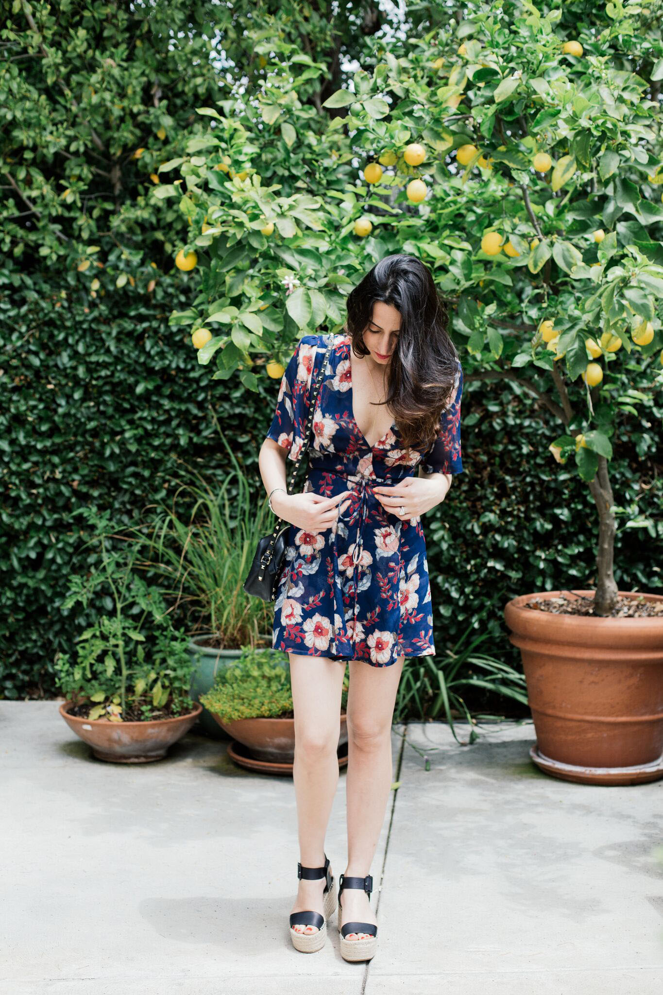 Blogger Style notes by belen wears reformation dress with valentino bag 1